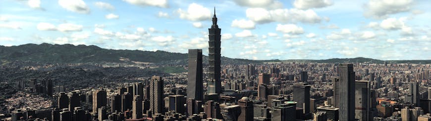 Taipei, Taiwan, in Cesium for Omniverse. The Taipei 101 skyscraper, resembling bamboo, is in the center of the image.