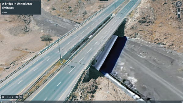 A 3D Tiles 3D mesh model of a bridge, reconstructed from photos by Cesium ion