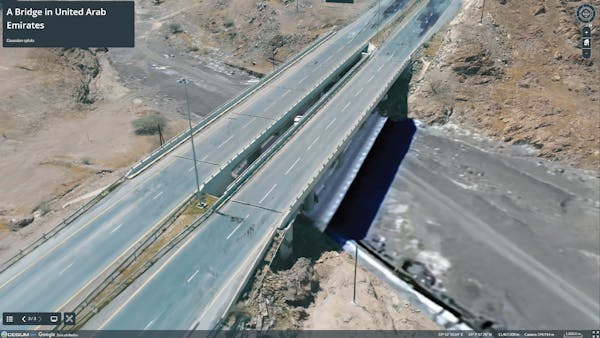 A 3D Tiles Gaussian splats model of a bridge, reconstructed from photos by Cesium ion