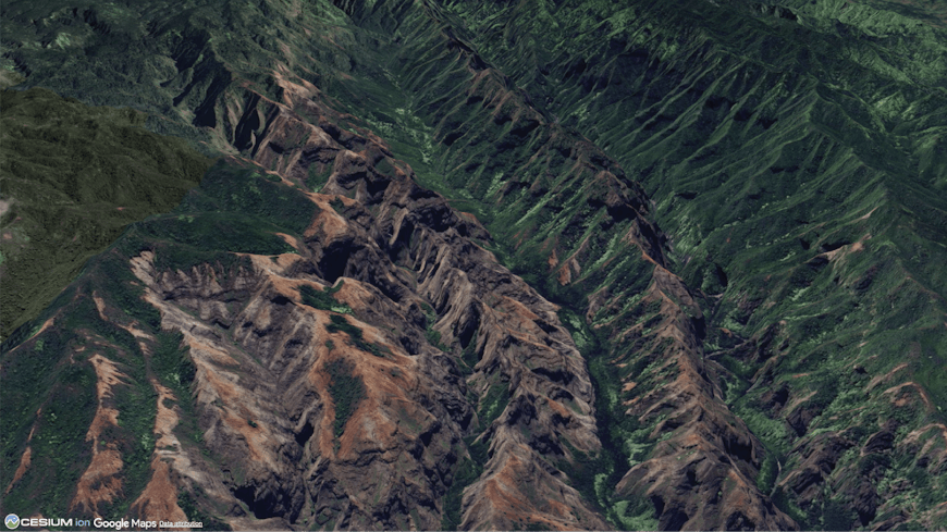 The mountains of the island of Kauai, Hawaii visualized with the Google Maps 2D Satellite asset from Cesium ion
