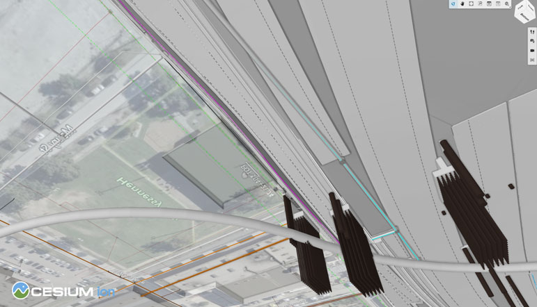 A bottom-up view highlights further design conflict between sewer pipes and the proposed bridge pilings. Courtesy WSB.
