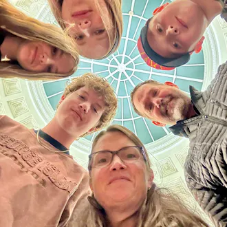 Dan VanBrunt and his family looking down at the camera.