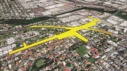 A footprint of a proposed design model projected onto Cesium World Terrain using CesiumGeoJsonDocumentRasterOverlay.