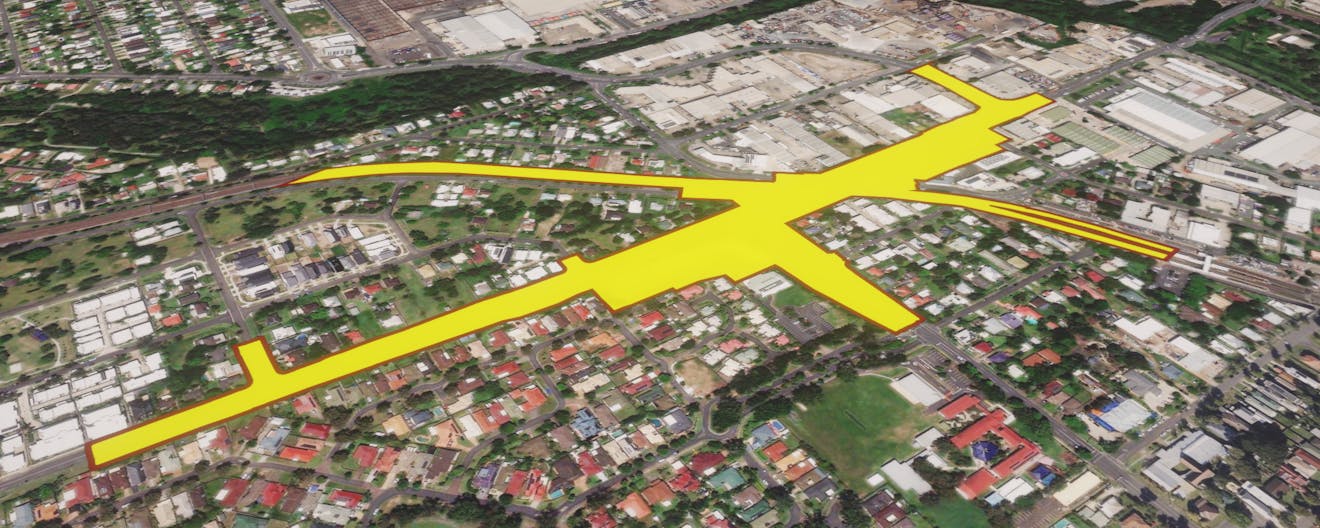A footprint of a proposed design model projected onto Cesium World Terrain using CesiumGeoJsonDocumentRasterOverlay.