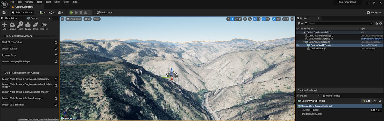 A screenshot showing terrain in the Editor viewport after Cesium World Terrain has been added.