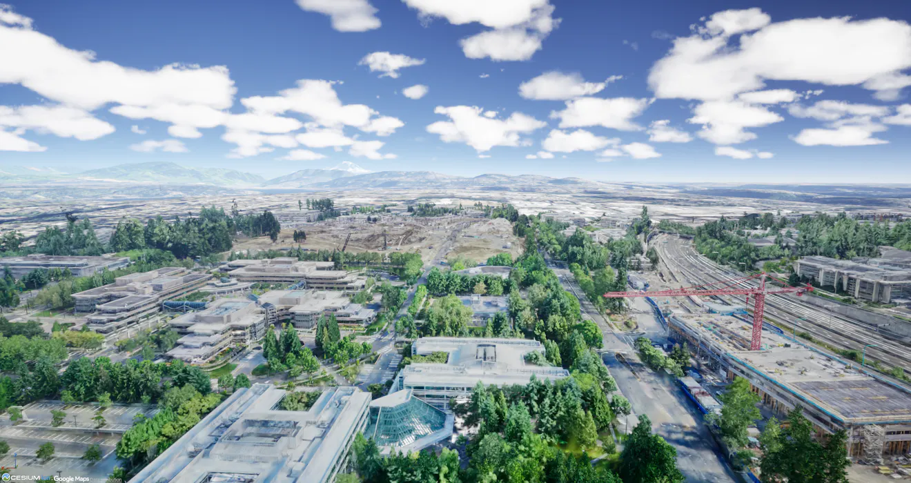 3D Gaussian splat tileset of the Microsoft Redmond Campus, shown in Unreal Engine with Cesium World Terrain. Captured in partnership with Bentley Systems from 20,169 photos (427.7 gigapixels), covering approximately 3.7  square km with 110  million splats. This dataset is used as a reference for focusing the actor at the center of the viewport.