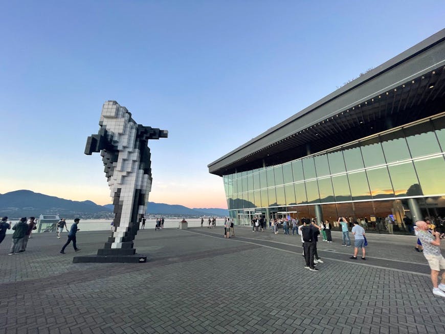 sculpture of a voxelized orca outside the Vancouver Convention Center