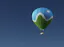 3D model of a Cesium logo branded hot air balloon against a blue sky