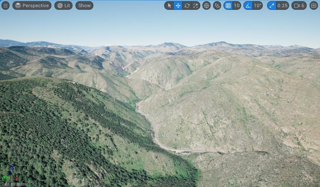 You should start to see terrain appear as Photorealistic 3D Tiles are streamed into the level.