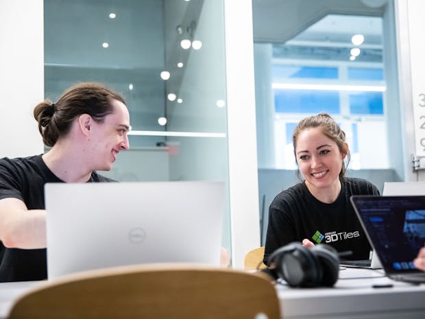 Josh Rouser and Jillian Weitkamp work at Cesium headquarters in Philadelphia