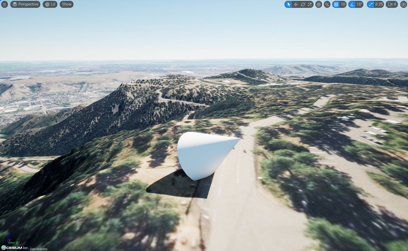 A screenshot showing a cone placed in the mountains near Denver.