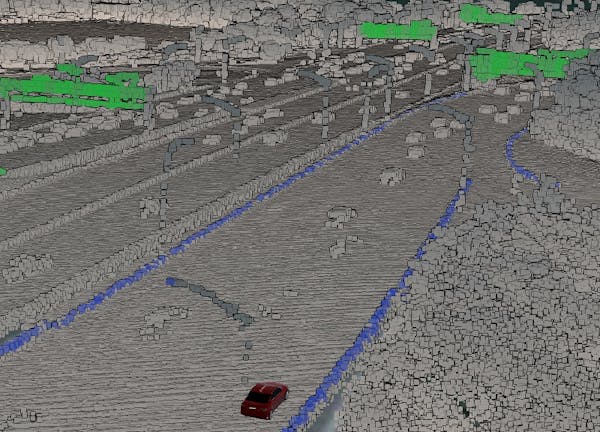 Point cloud data of Washington DC highway, classified at runtime using volumes from an independent data source indicating curbs and highway signs.