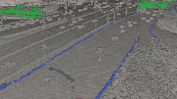 Point cloud data of Washington DC highway, classified at runtime using volumes from an independent data source indicating curbs and highway signs.