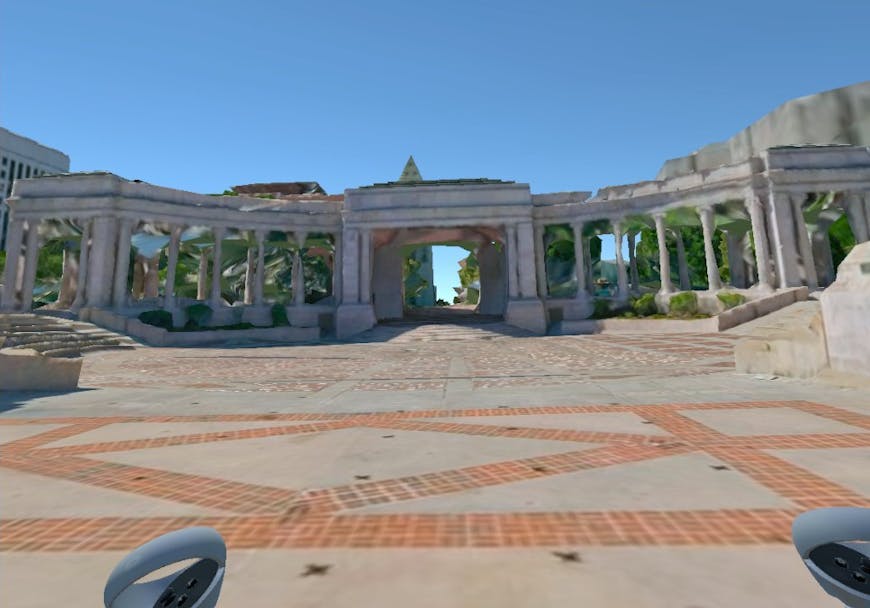 Civic Center Park in Denver, Colorado, USA, rendered in Cesium for Unity in a VR environment. There are stone steps, columns, and arches, trees, and the top of the public library.