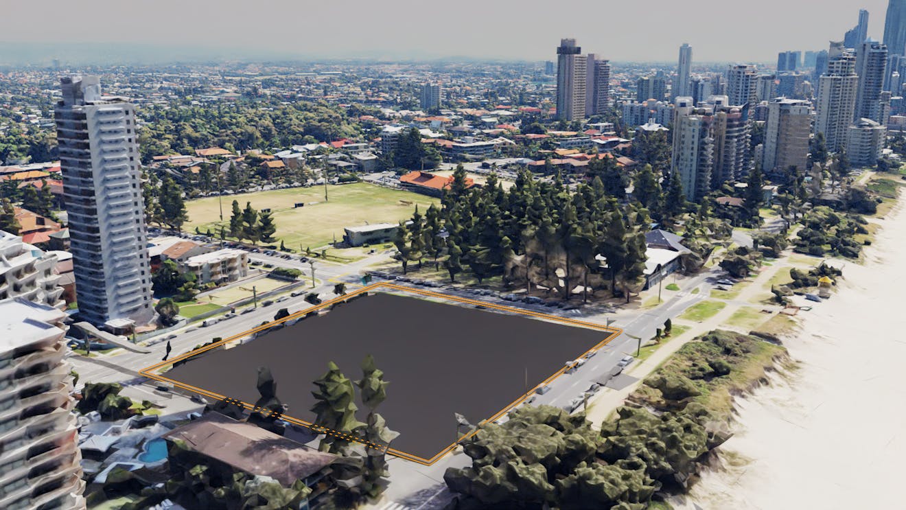 Cesium for Omniverse tutorial: tileset clipping. An area on the Gold Coast, Australia, with high-rise buildings, trees, swimming pools, and a field. A black square outlined in orange represents a clipped tileset.