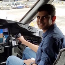 Shehzan Mohammed in the cockpit of an aircraft. 
