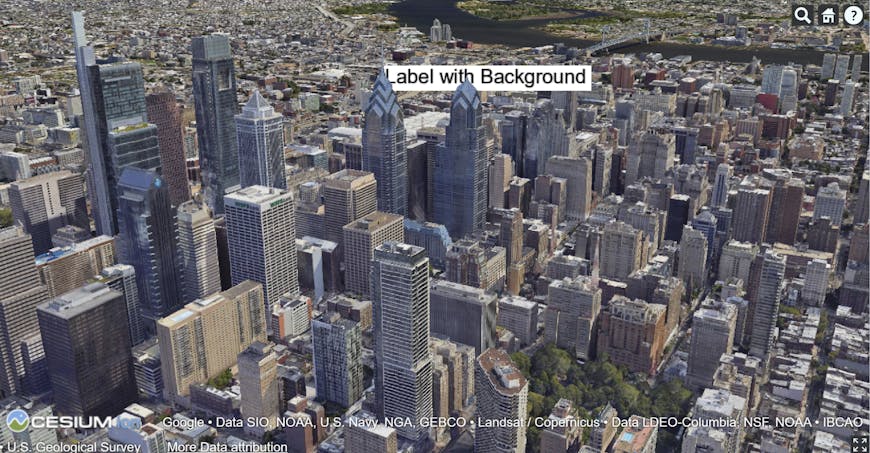 Philadelphia, PA, USA, in Google Maps Platform's Photorealistic 3D Tiles visualized in CesiumJS. There is a white box with black text reading "Label with Background" in the middle, demonstrating a fix in the latest CesiumJS release.