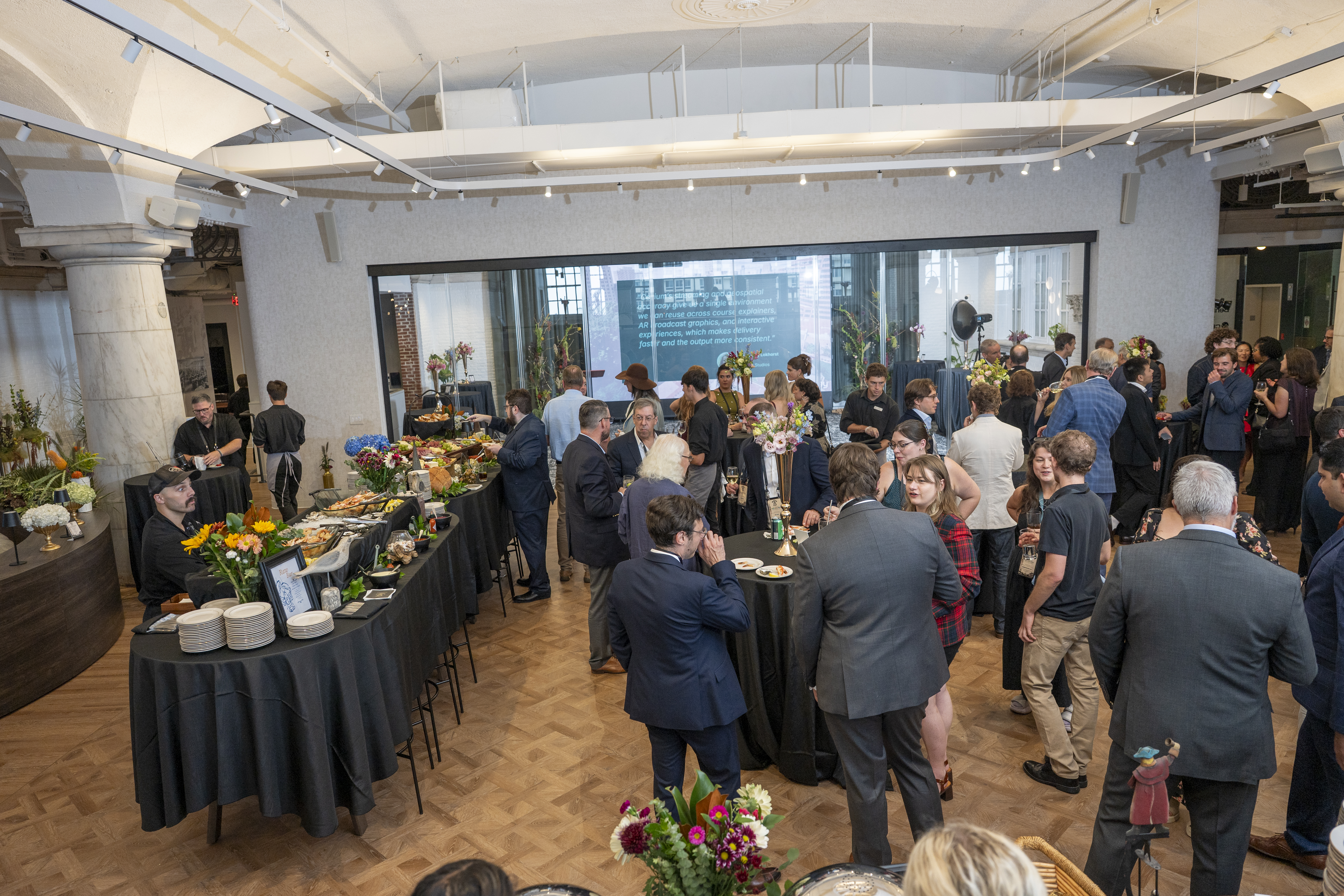 mingling at Philadelphia office opening party