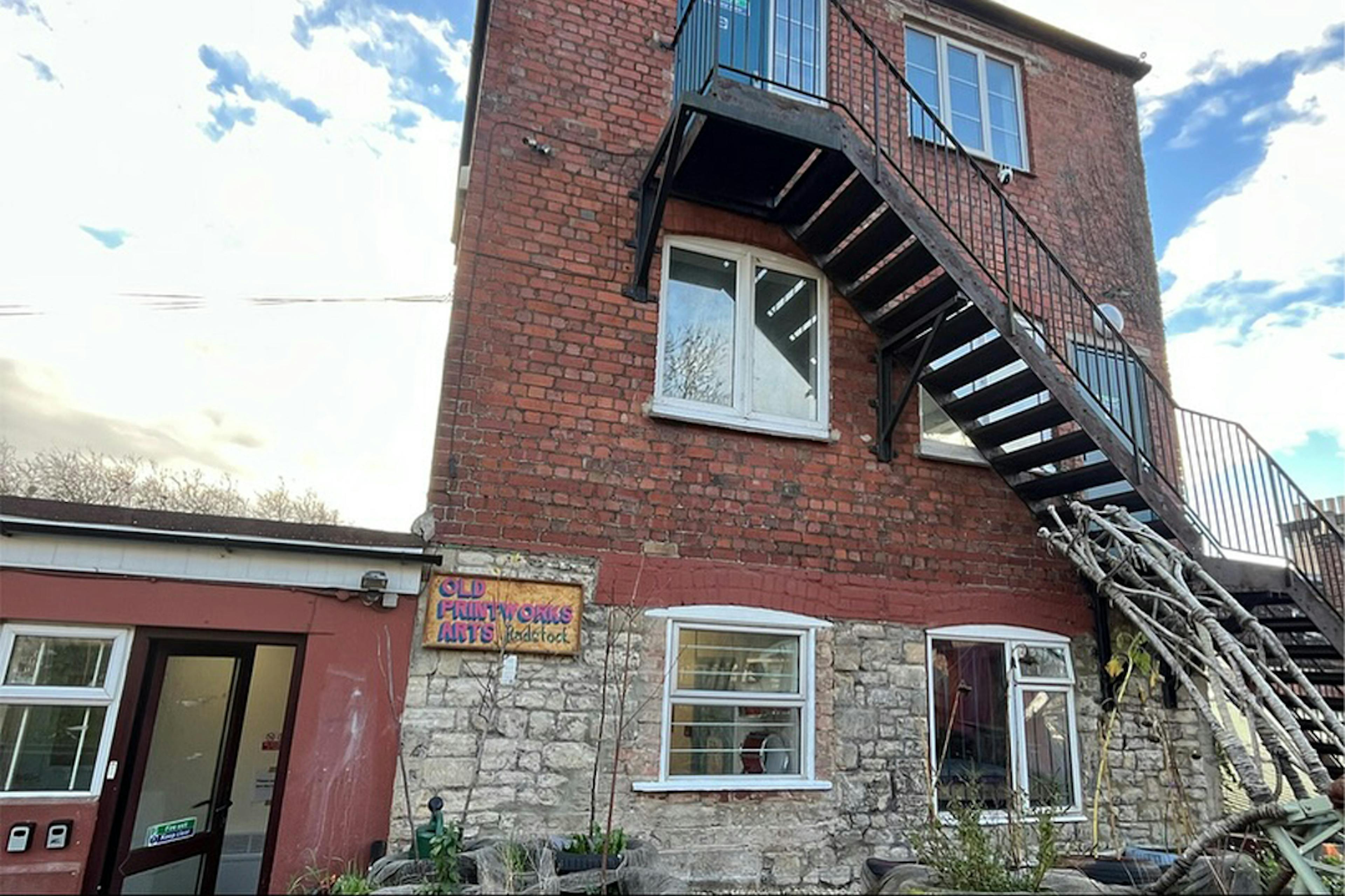 Rear of the Old Printworks Arts Building, Old Printing Works, Waterloo Rd, Radstock, BA3 3EP.