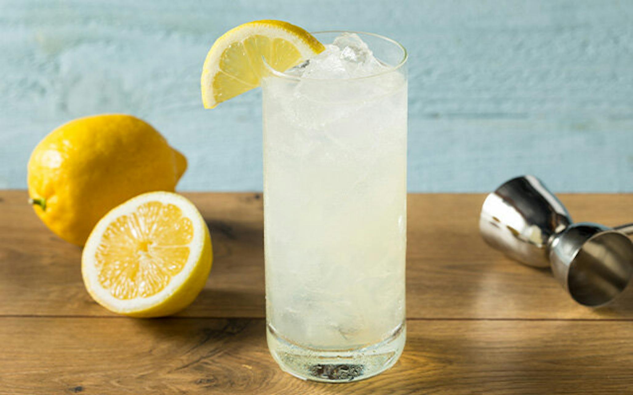 Vanilla Tom Collins cocktail with lemon garnish