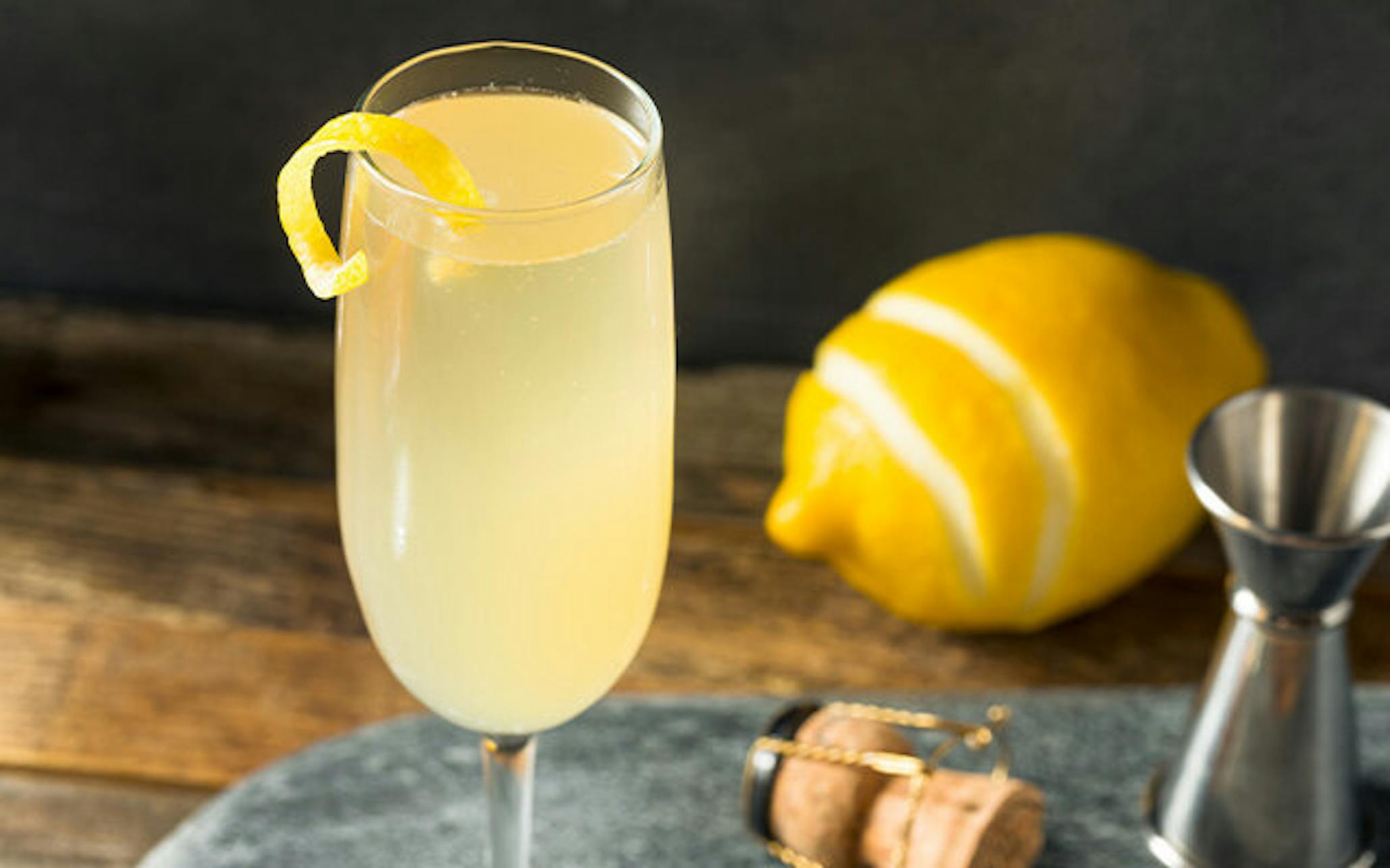 Vanilla French 75 cocktail with lemon peel twist garnish