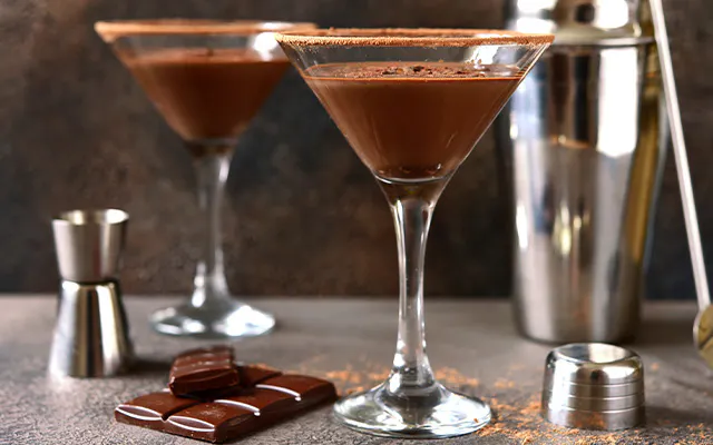 Nutella Martini cocktail recipe for dessert in a martini glass with a chocolate rim