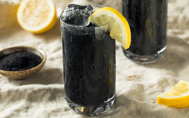 Black food colouring Halloween cocktail garnish idea