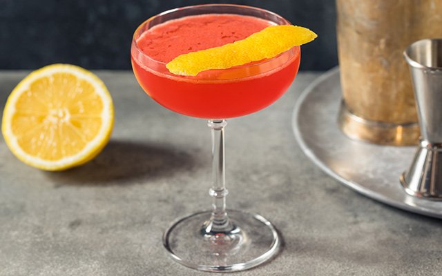 Aperol & Amaretto Sour with gin and Angostura bitters