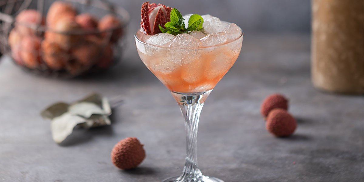 Lychee, sparkling white wine and gin come together in this stunning
