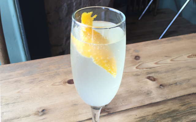 Poetic license 75 gin cocktail