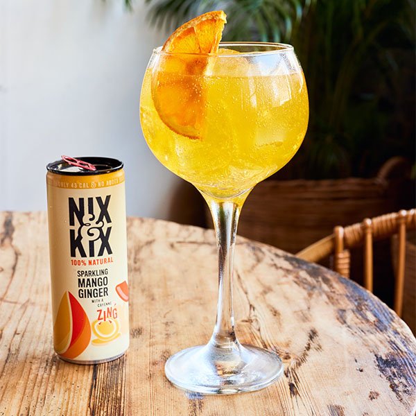 Gin and ginger cocktail with mango