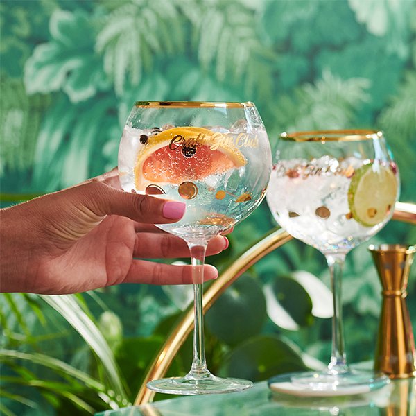 Holding a Craft Gin Club Branded Glass