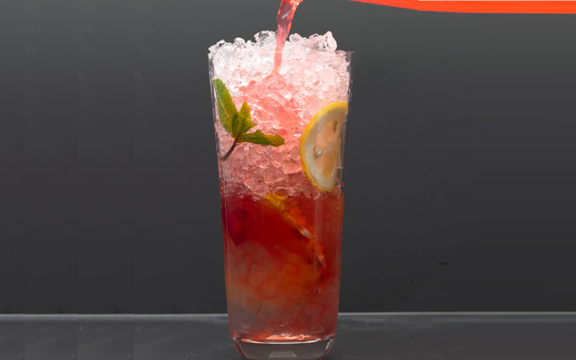 Spiced Gin Daisy flower cocktail drink over ice