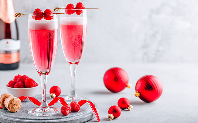 NYE cocktail with pink gin and prosecco