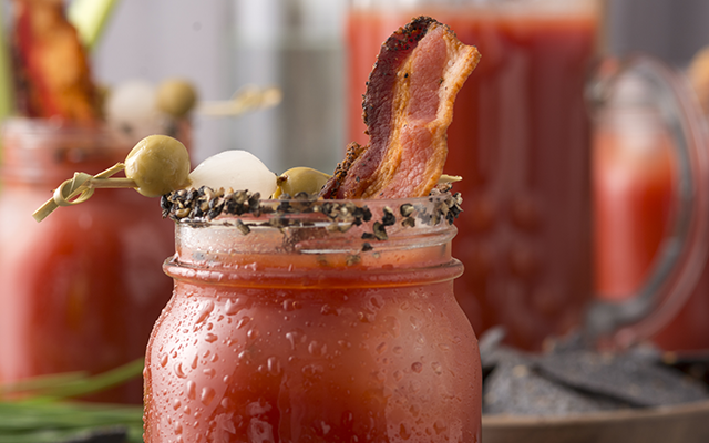Oh boy! Brunch is served… on the edge of your cocktail! Coat the rim of your glass in crushed black peppercorns, grill a rasher of bacon and pop it into your Red Snapper, add some cocktail onions and olives (or a mini scotch egg?!) to a cocktail sti…