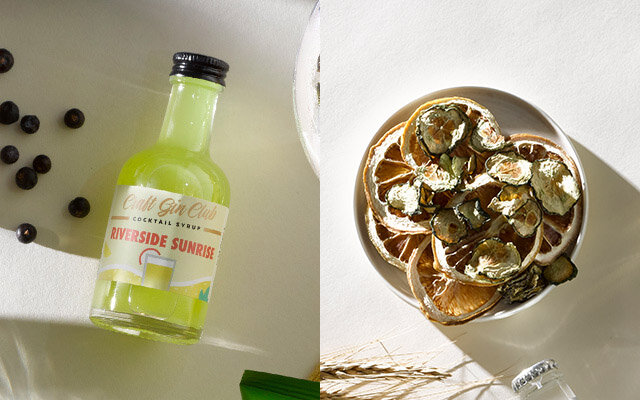 Riverside Sunrise cocktail syrup and lemon & cucumber garnishes