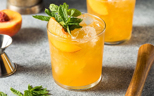 Peach fizz with mint garnish