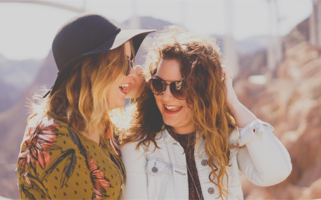 Two girls laughing