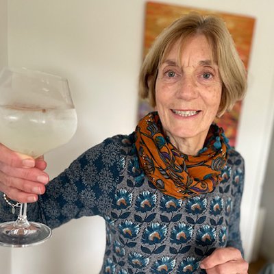 One of November's Golden Ticket winners, holding a G&T to cheers the camera