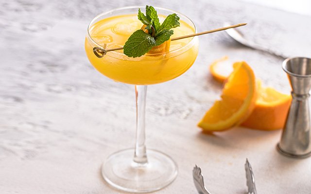 Gin and Viper Hard Seltzer cocktail suggestion with orange juice