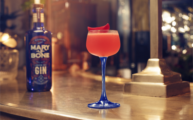 Lady Marylebone Gin red strawberry cocktail on gold bar