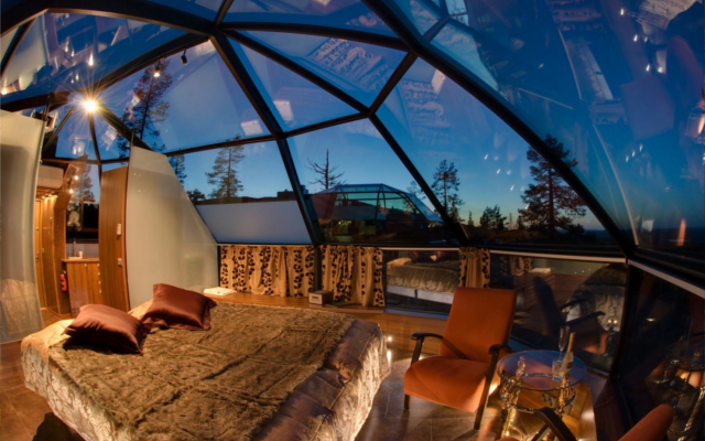 cosy Igloo in the arctic circle northern lights