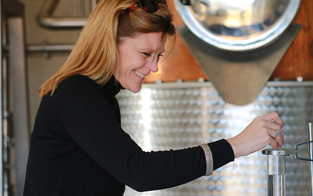 Anna happily at work at the still