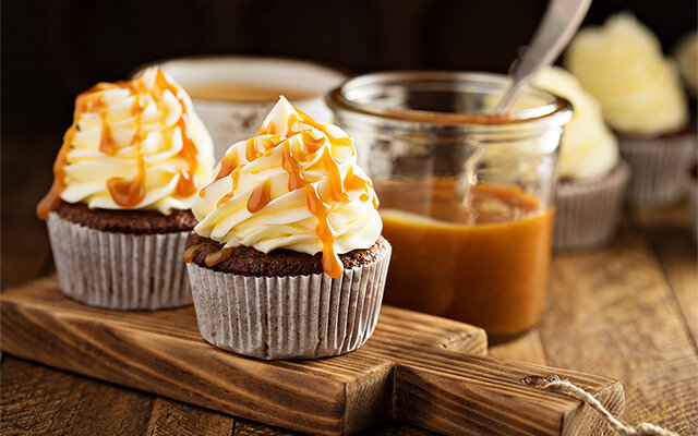Gingerbread cupcakes with toffee gin icing and salted caramel! Get the recipe >>