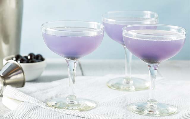 A maraschino cherry is the perfect garnish for a classic Aviation cocktail