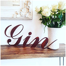 Rustic metal gin sign.jpg