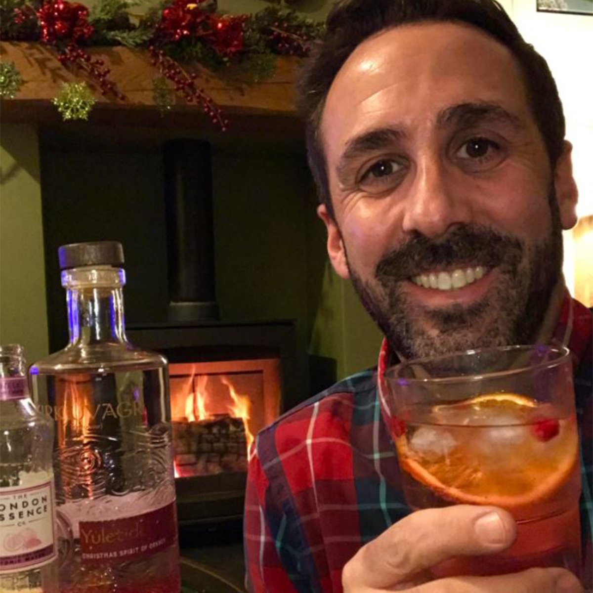 Ryan M. enjoying a festive tipple by the fireside! 