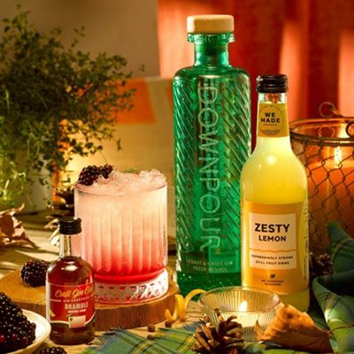 The gin, syrup and mixer used to make Craft Gin Club's Bramble Cocktail, alongside the cocktail itself