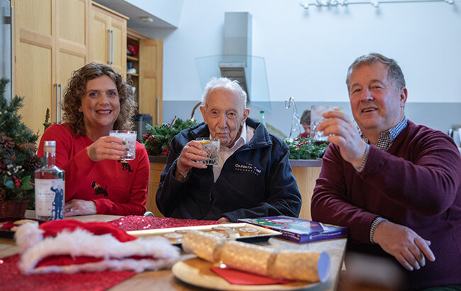 Captain Tom (middle) with Otterbeck Distillery founders Dougie and Nicola Lampkin. Image: The Spirits Business