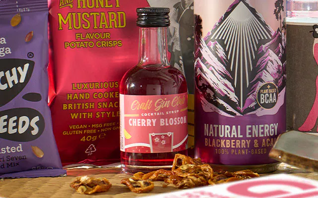 Craft Gin Club's Cherry Blossom Cocktail Syrup and kumquat garnish for April 2024